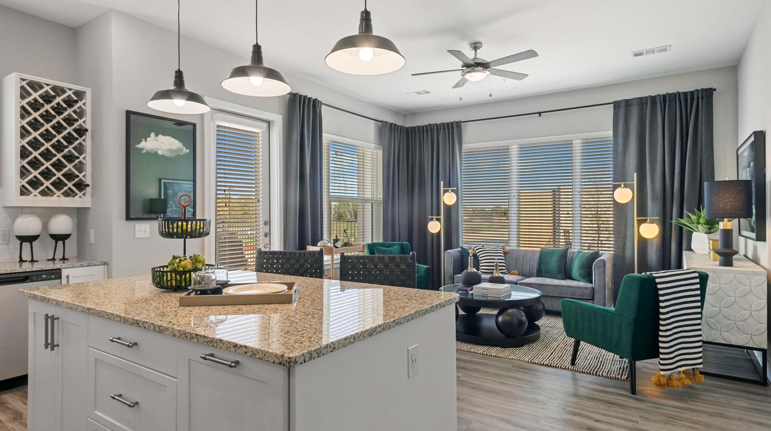 Gin Mill apartment rendering with comfortable living space and modern kitchen.