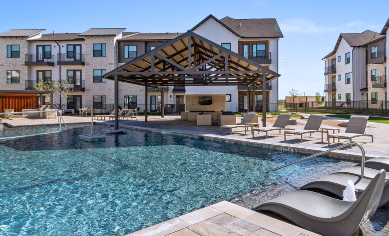 Gin Mill pool area with lounge chairs and large gazebo.